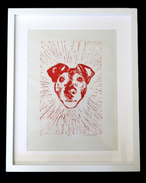 lino print of dog in red ink in white frame